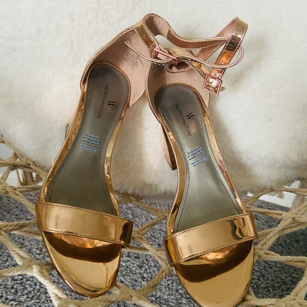 A pair of beautiful rose gold shoes